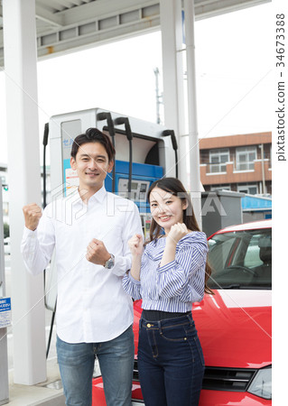 Gas station refueling self person drive car rental Gas station refueling self person drive car rental 34673388