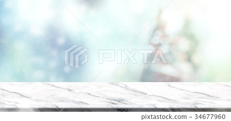 white marble table with abstract blur christmas 34677960