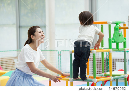 Happy holiday parent and child Happy holiday parent and child 34679962