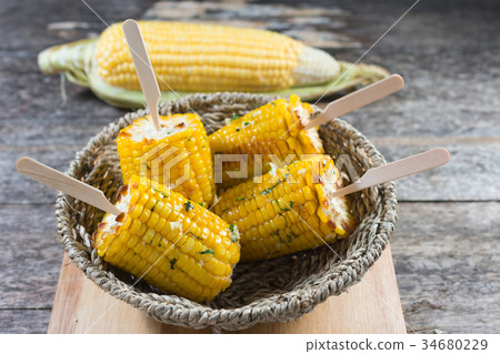 Grilled corn with butter 34680229