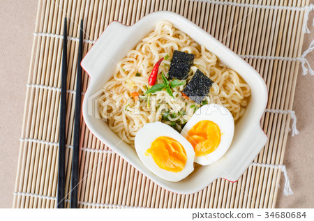 Instant noodles with boiled egg and seaweed Instant noodles with boiled egg and seaweed 34680684