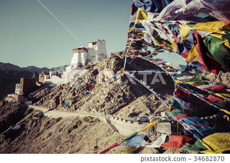 Prayer tibetan flags near Namgyal Tsemo Monastery Prayer tibetan flags near Namgyal Tsemo Monastery 34682870