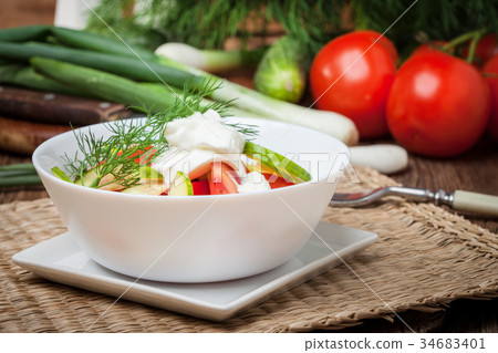 Fresh salad in white bowl. 34683401