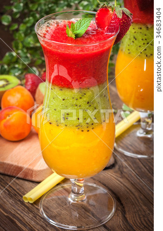 Smoothies with fresh fruit. 34683404