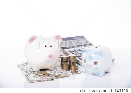 pile coin with calculator and piggy bank. pile coin with calculator and piggy bank. 34685138