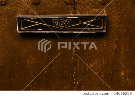 Old letterbox in the door Old letterbox in the door 34686299