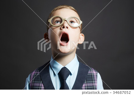 screaming child in funny glasses 34687052