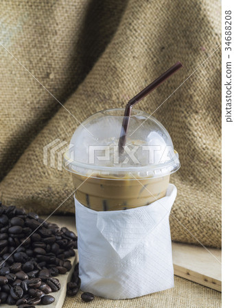 Iced coffee with beans. 34688208