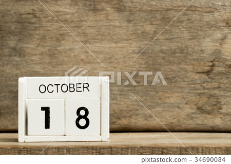 White block calendar present date 18 and October White block calendar present date 18 and October 34690084