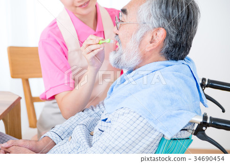 Nursing home care scene elderly care assistance scene oral care gargling tags 34690454