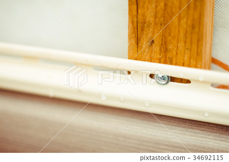 installation of siding on the facade of the house 34692115