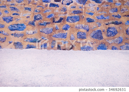 Sand with stones in cement Wall. Sand with stones in cement Wall. 34692631