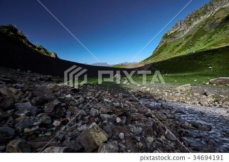 Beautiful mountain landscape with bright blue sky 34694191