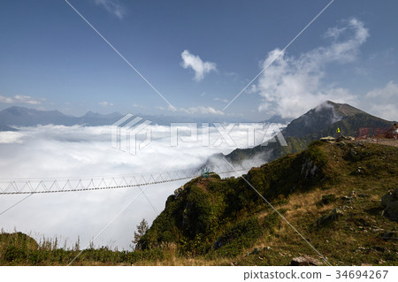 Beautiful landscape with suspension bridge in Beautiful landscape with suspension bridge in 34694267