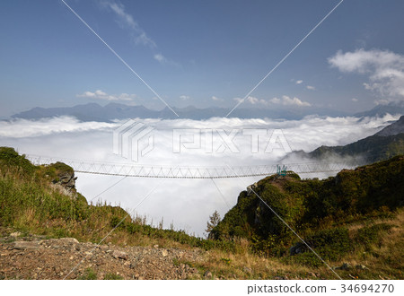 Beautiful landscape with suspension bridge in Beautiful landscape with suspension bridge in 34694270