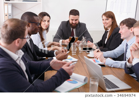 Business meeting of young successful team with 34694974