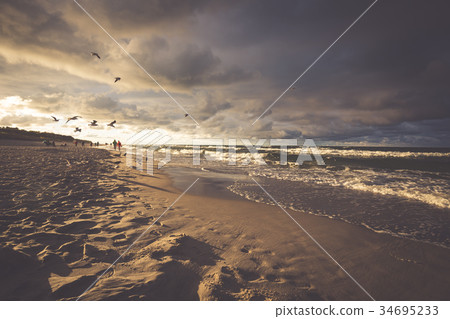 Seascape with dark, dramatic, stormy cumulonimbus Seascape with dark, dramatic, stormy cumulonimbus 34695233