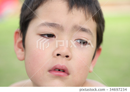 Crying child 34697234