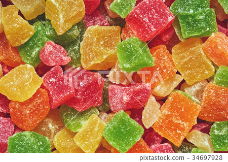 Sweet dry candied fruits, diced pineapple succades Sweet dry candied fruits, diced pineapple succades 34697928