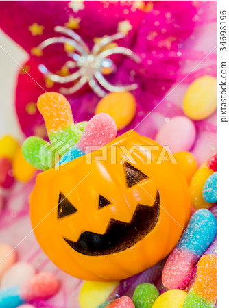 Halloween pumpkin, trick or treat with sweet candy 34698196