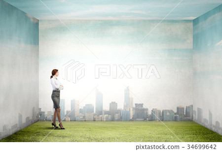 Pensive businesswoman Pensive businesswoman 34699642