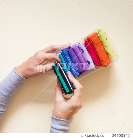 Clothes storage. Order in the closet. Clothes storage. Order in the closet. 34700543