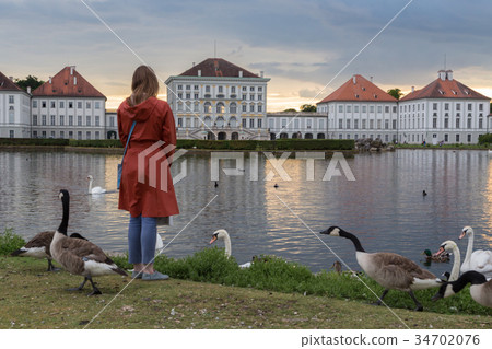 Dramatic post storm sunset scenery of Nymphenburg Dramatic post storm sunset scenery of Nymphenburg 34702076