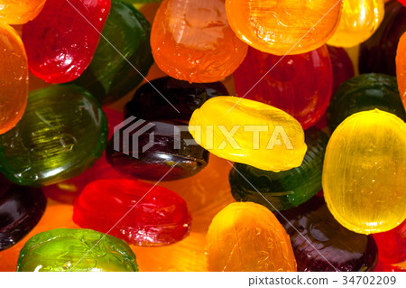 background from colorful sweets of sugar candies. background from colorful sweets of sugar candies. 34702209