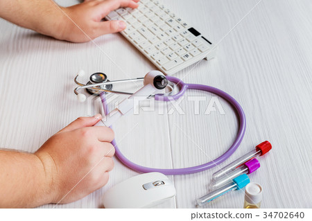 Doctor hand the medical blood tube in laboratory Doctor hand the medical blood tube in laboratory 34702640