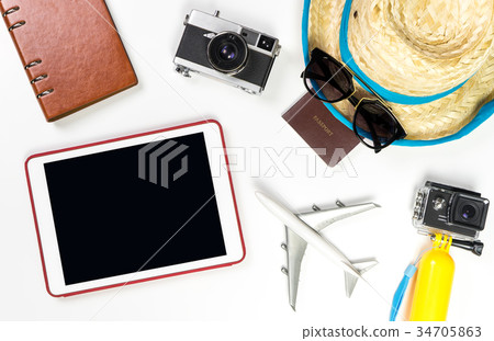 Empty tablet screen with summer travel fashion Empty tablet screen with summer travel fashion 34705863