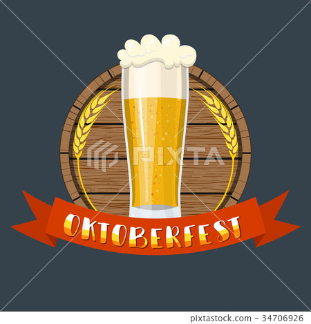 Glass of beer on a wooden barrel. 34706926