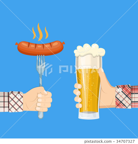 sausage on fork and lager glass beer in hand 34707327