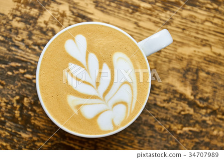 Flower latte art, top view. 34707989