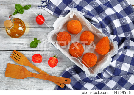 deep fried sicilian arancini, top view 34709566