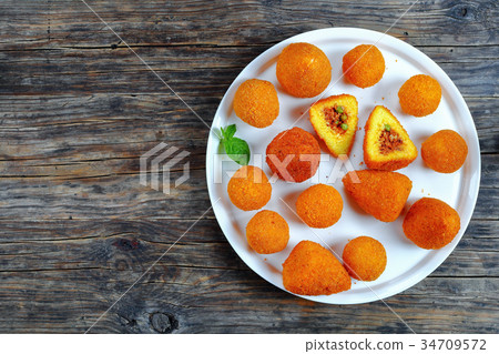 arancini - classic italian cuisine, top view 34709572