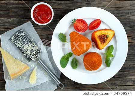 deep fried arancini - classic italian cuisine 34709574