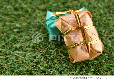 Coin folding Ribbon is Bananas with Sticky rice Coin folding Ribbon is Bananas with Sticky rice 34709792