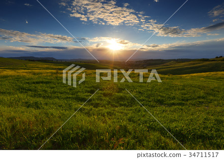 Landscape with field at sunset in Tuscany 34711517