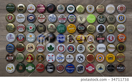 Beer corks on a wooden table 34711738