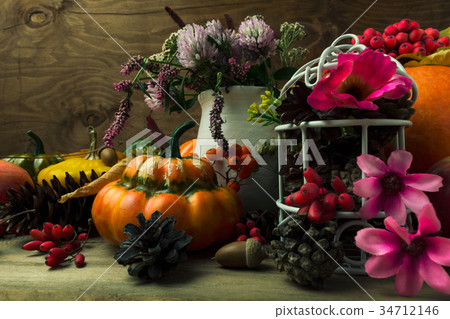 Thanksgiving arrangement with pink flower birdcage Thanksgiving arrangement with pink flower birdcage 34712146