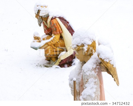 Christmas nativity scene, angel with lamb in the Christmas nativity scene, angel with lamb in the 34712432