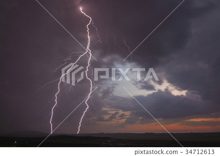 Twilight lightning on the African steppe Twilight lightning on the African steppe 34712613