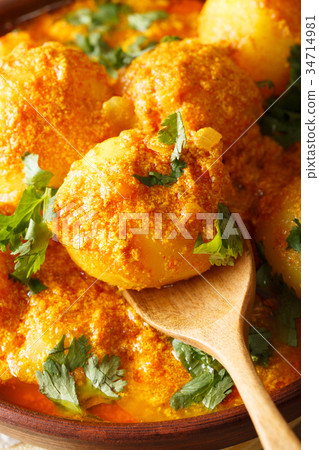 Freshly prepared spicy potato curry Freshly prepared spicy potato curry 34714981
