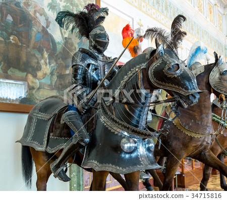 Medieval Knights in armor on a horses Medieval Knights in armor on a horses 34715816