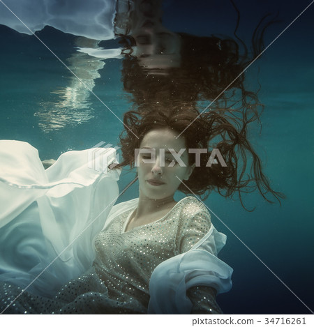Girl in white dress underwater Girl in white dress underwater 34716261