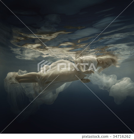 Girl in white dress underwater Girl in white dress underwater 34716262