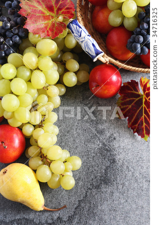Autumn, fruits in wicker basket 34716325
