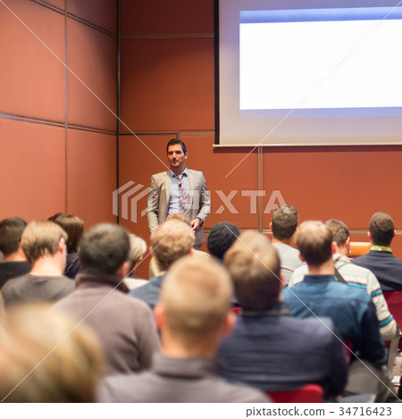 Speaker Giving a Talk at Business Meeting. Speaker Giving a Talk at Business Meeting. 34716423