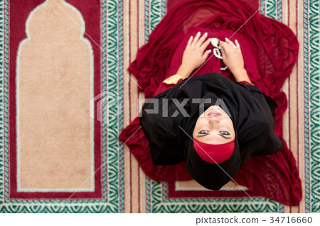 Top aerial view Young beautiful Muslim Woman 34716660