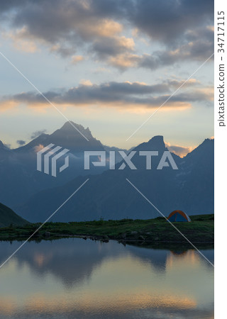 Tourist tent in mountains Tourist tent in mountains 34717115